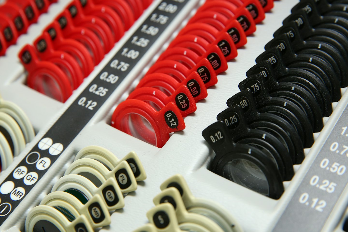 Optometrist's trial lens set in a white tray.